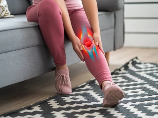 Knee pain, woman suffering from osteoarthritis