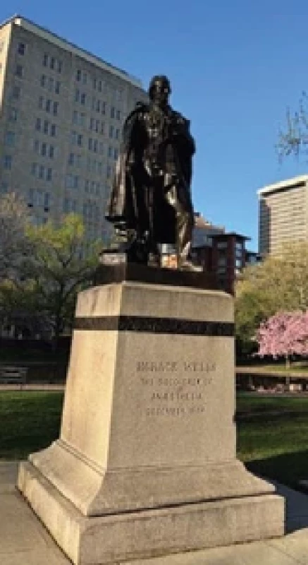 Horace Wells a jeho bronzová socha v městském parku v Hartfordu.