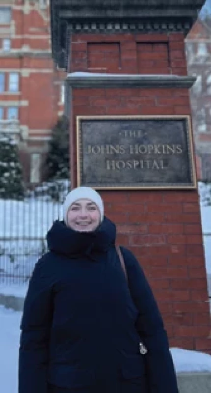 Author in front of Johns Hopkins Hospital building.